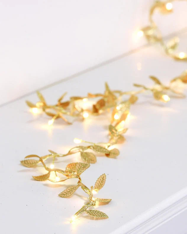 Golden leaves on mantel
