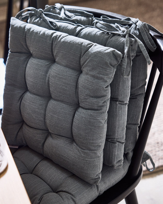 Alassio Blue Seat Pads with Ties on a chair