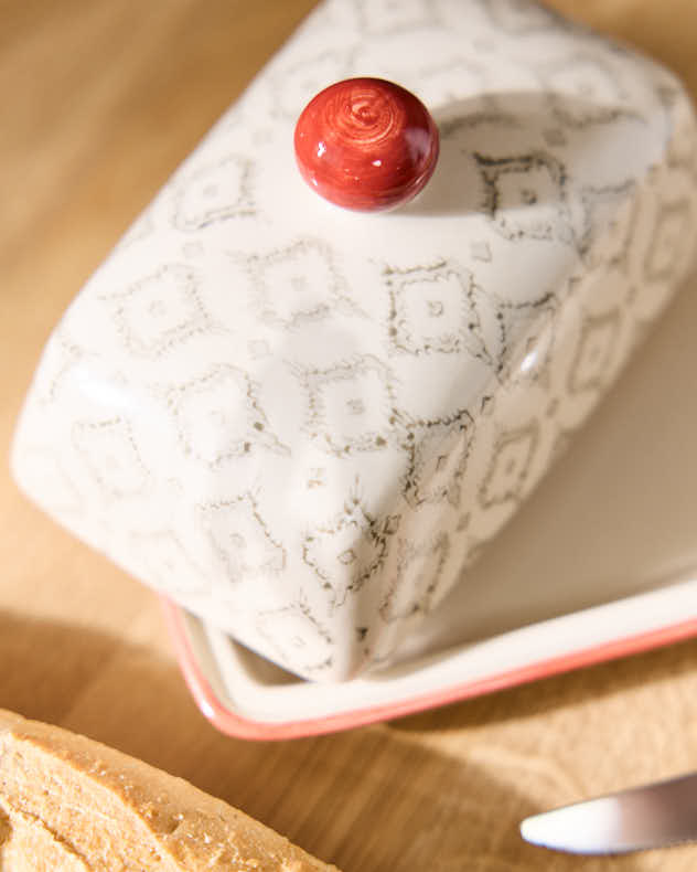 Beurrier à motifs orange coucher de soleil et losanges