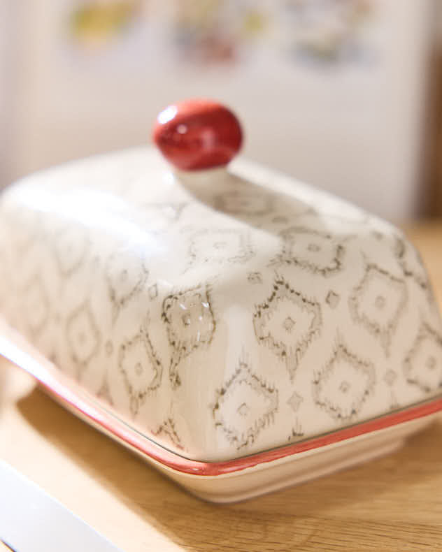 Beurrier à motifs orange coucher de soleil et losanges