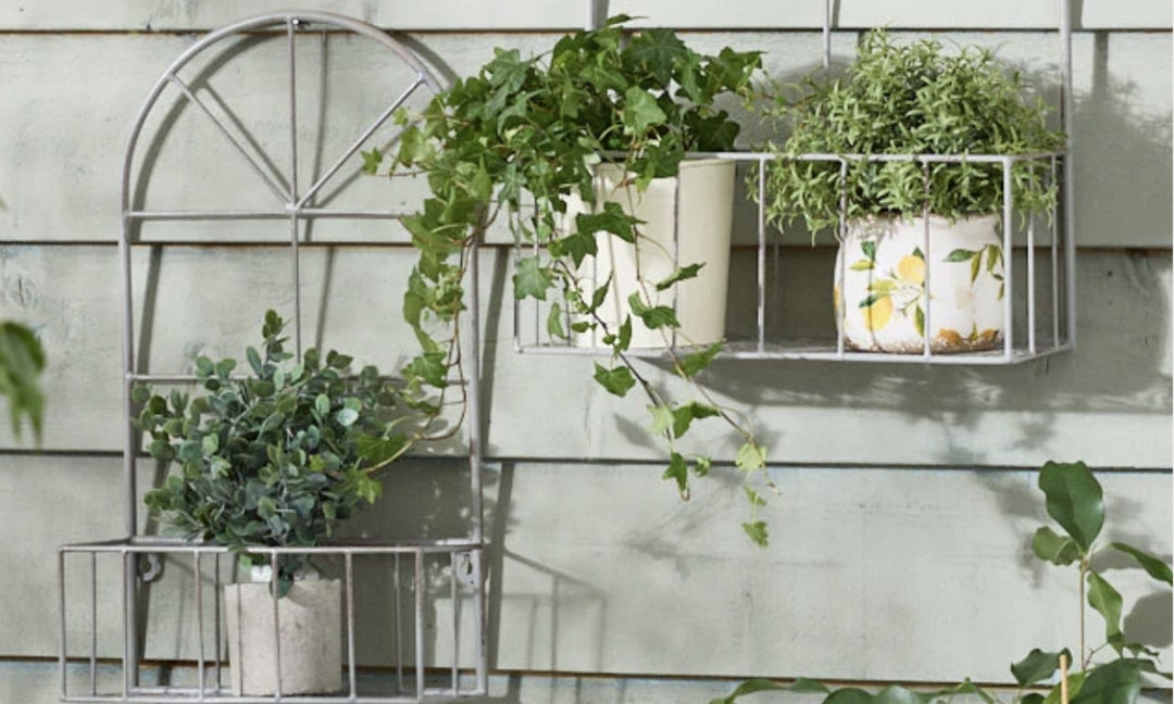 Rustic Elegance: Incorporating Planters with Wooden Stands into Your Decor