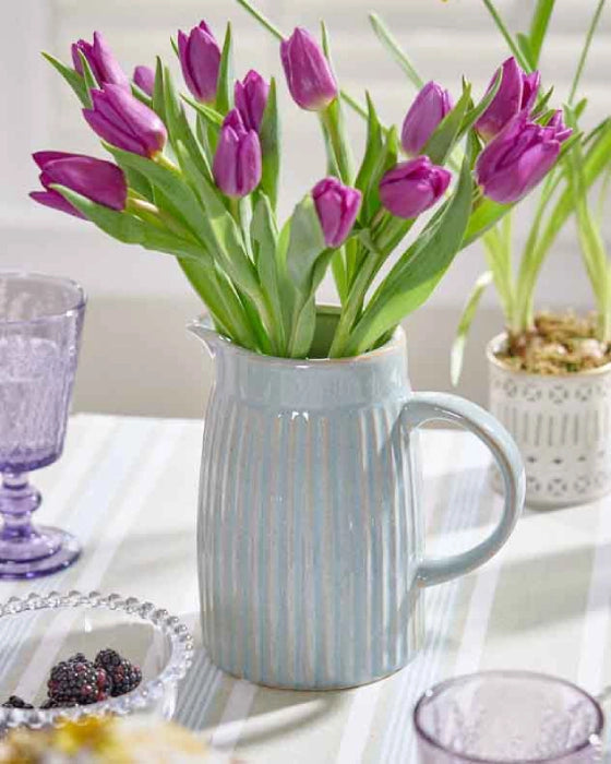 Ribbed Blue Pitcher Jug Vase with tulips