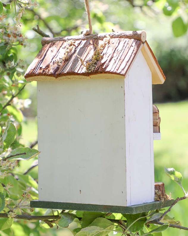 White Country Cottage Bird Hotel backside