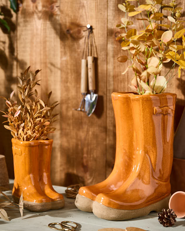 Little &amp; Large Orange Welly Boot Plant Pots