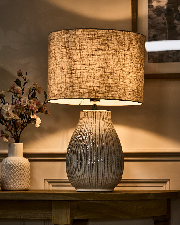 Distressed Ceramic Table Lamp With Light Tuned On