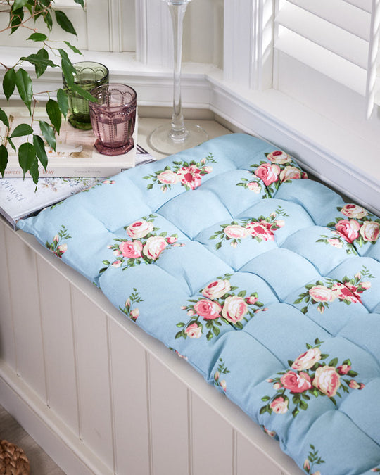 Coussin de banc bleu vintage rose
