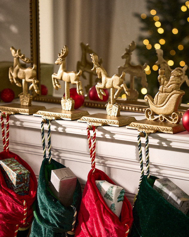 Santa's Sleigh Set of 4 Gold Stocking Holders