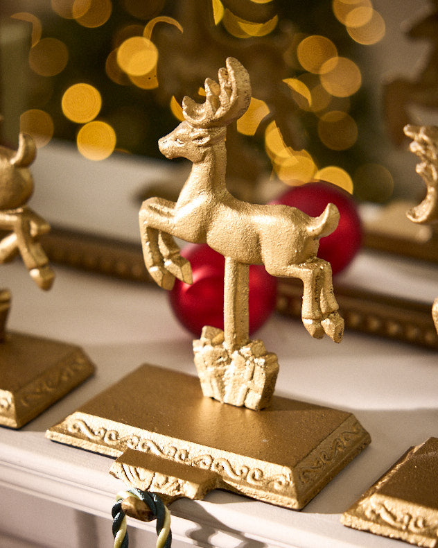 Prancing Reindeer Gold Stocking Holder