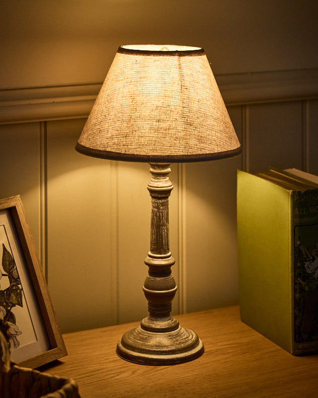 Pella Wooden Table Lamp with Light Tuned on 