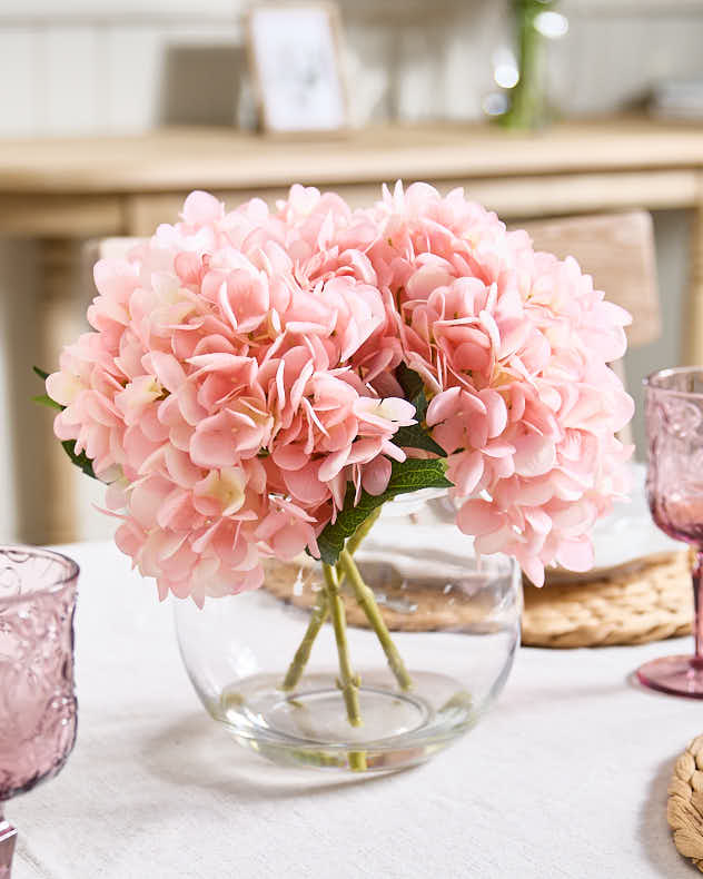 Pink Hydrangeas in Glass Globe Vase