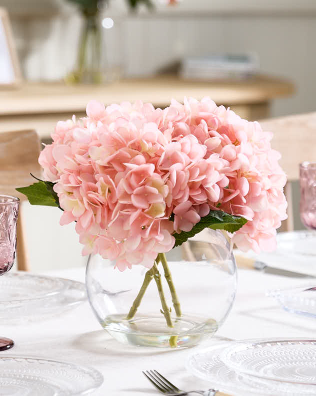 Pink Hydrangeas in Glass Globe Vase