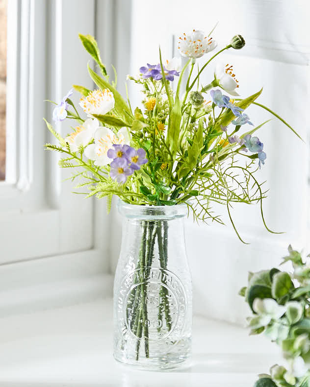 Buttercup Floral Spring Houseplant in Bottle Vase