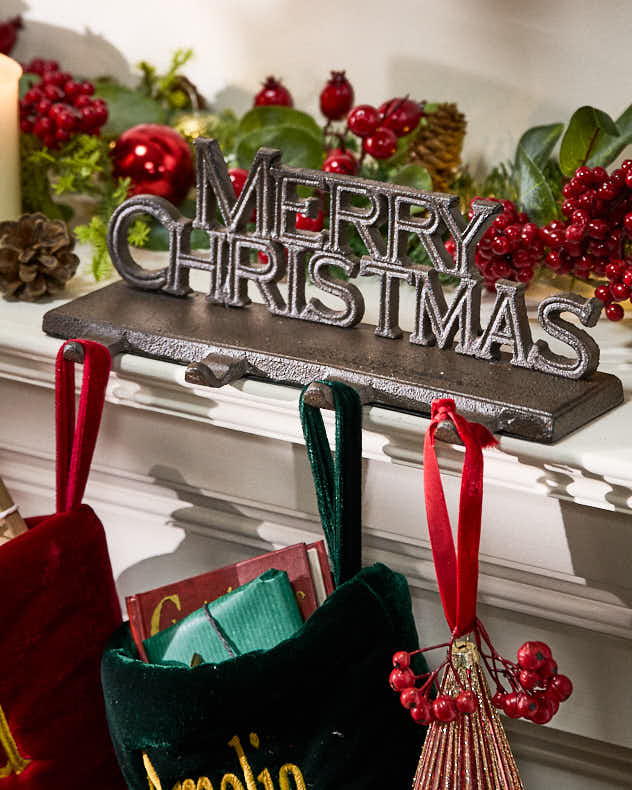 Brown Cast Iron Stocking Holders - Merry Christmas 4 Stocking Holders