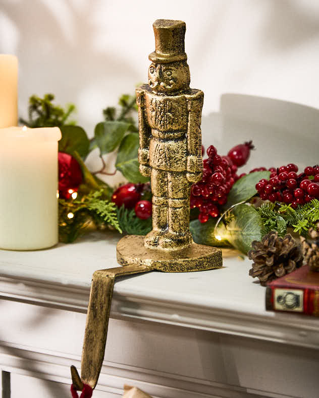 Gold Cast Iron Stocking Holders - Gold Nutcracker Stocking Holder
