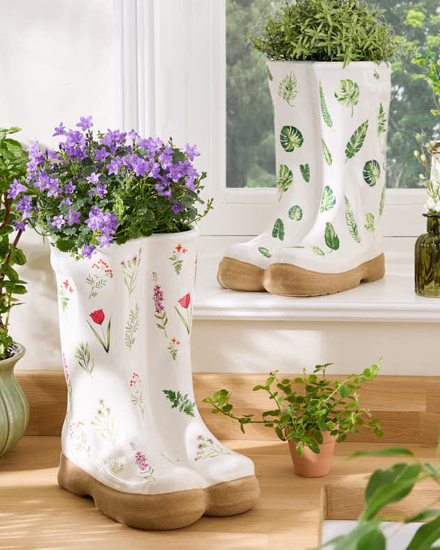 Große, gemusterte Gummistiefel-Pflanzgefäße