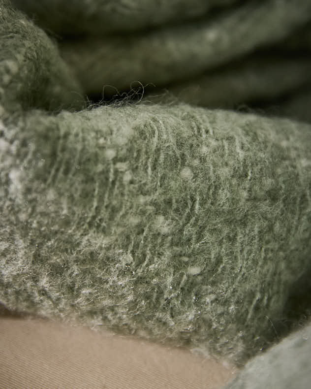 Wendbare Wolldecke mit grünem Muster