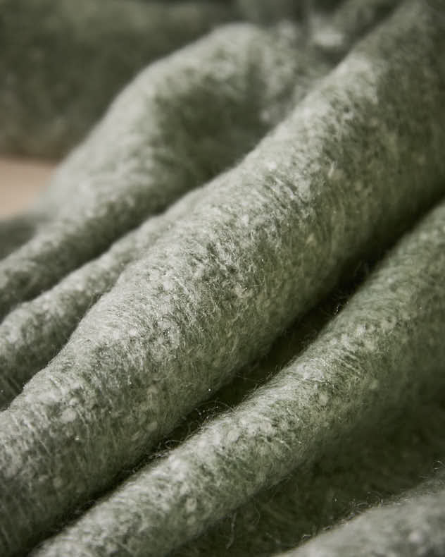 Wendbare Wolldecke mit grünem Muster