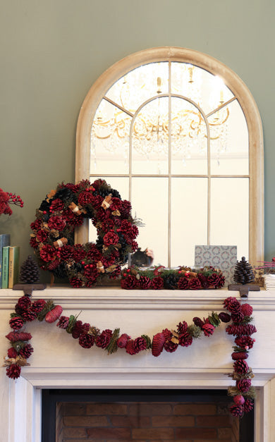 cinnamon christmas wreath and garland on mantle