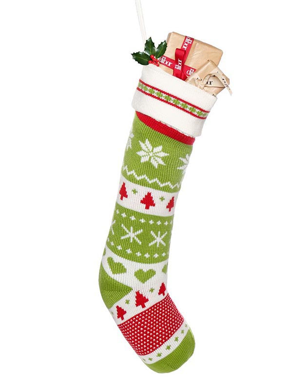 present filled traditional christmas stocking