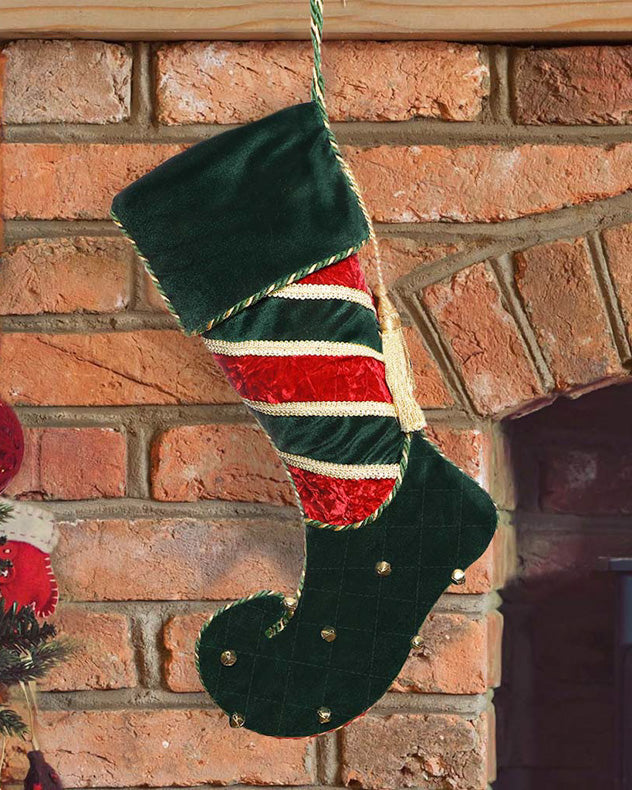 velvet green christmas stocking on mantle