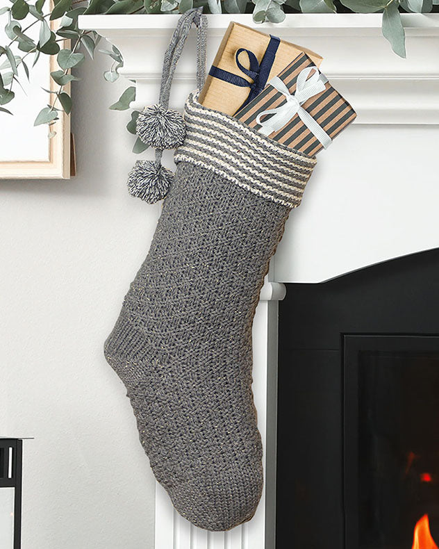 chunky knit grey stocking present filled
