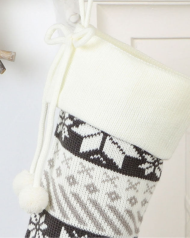 knitted christmas stocking with pom pom