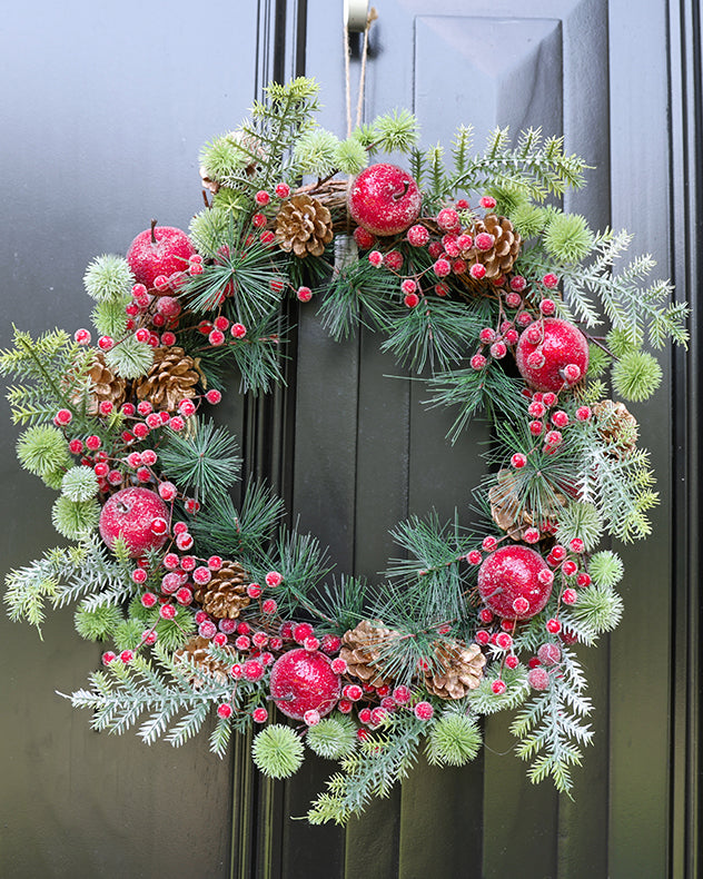 red and green front door berry pinecone christmas wreath