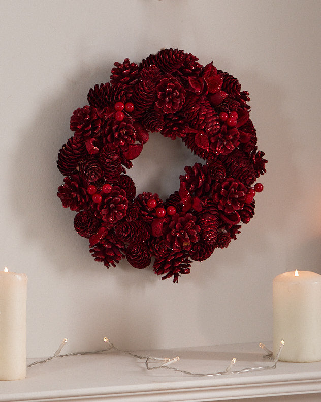 red berry and pinecone wreath