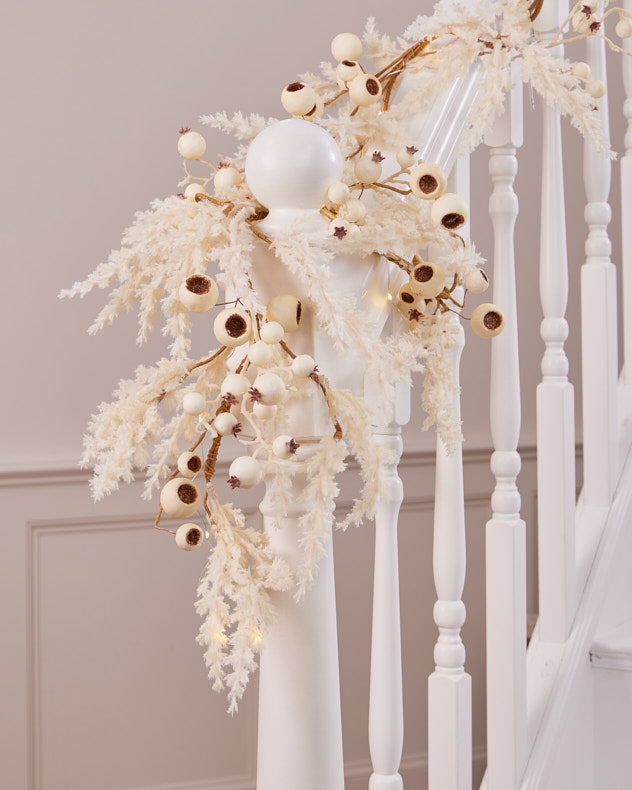 white christmas garland on banister