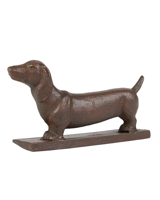 Dachshund playing with doorstop sale