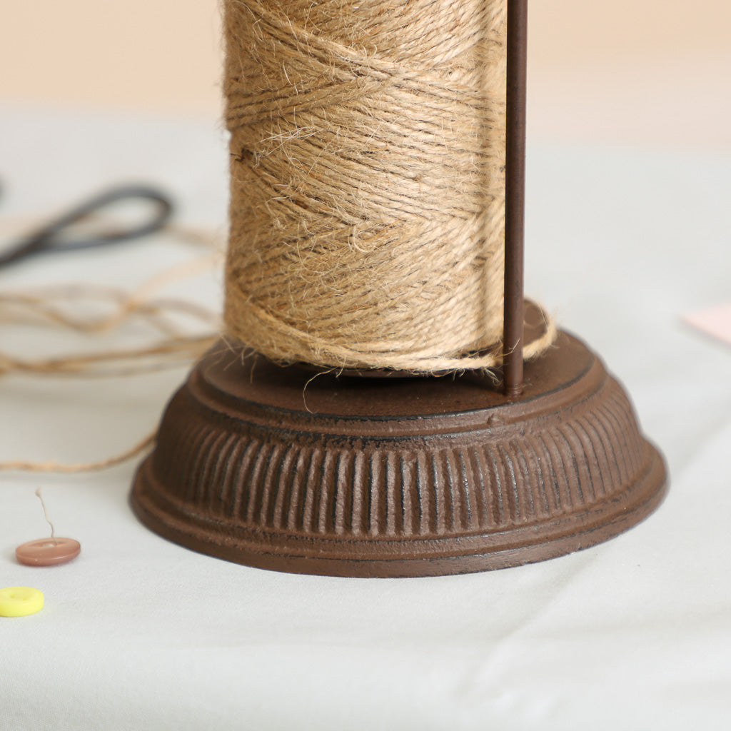 bird string holder with scissors