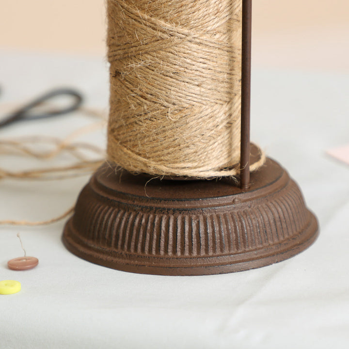 bird string holder with scissors