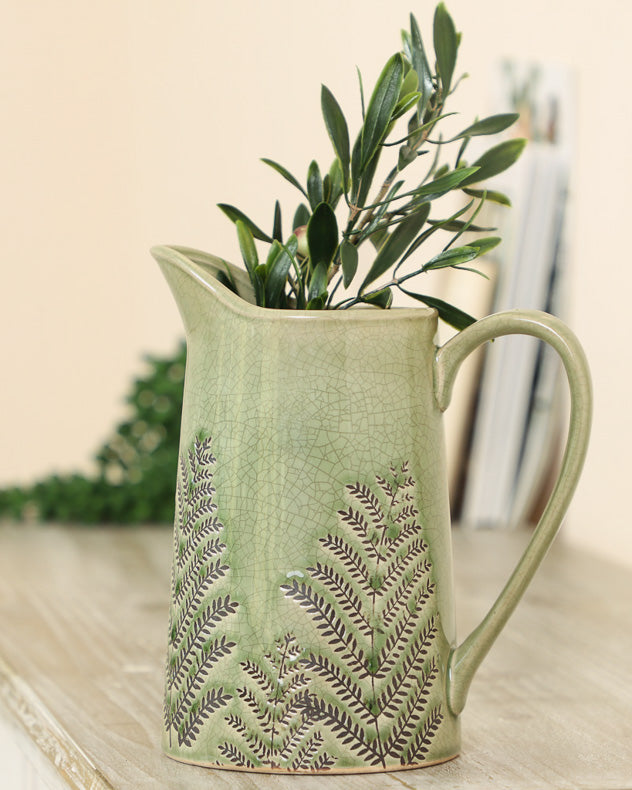 green ceramic flower vase