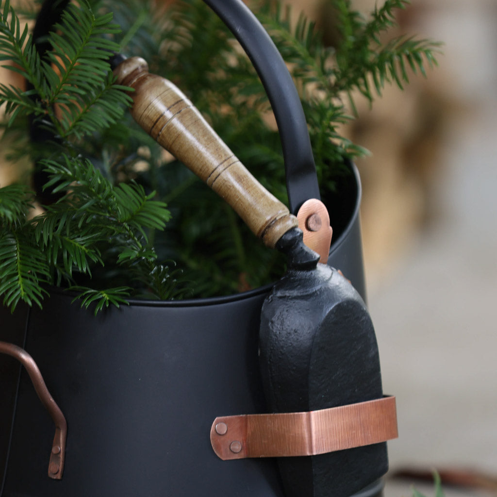 Traditional coal scuttle with shovel