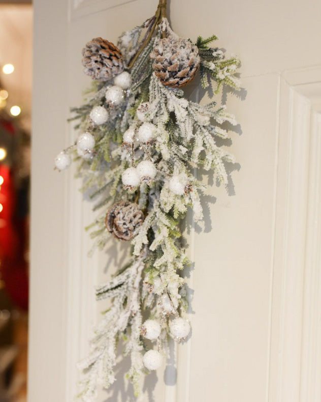 white berry and pinecone christmas swag decoration